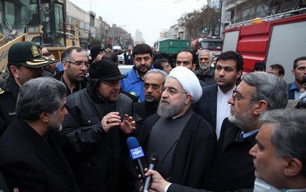 Rouhani visits Tehran’s collapsed Plasco building  